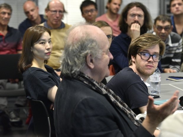 The participants (and many interested audience members) listen to Wolfgang Rihm talk at the Composer Seminar 2019