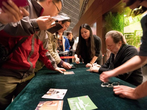 Riccardo Chailly signing autographs after a concert with the Lucerne Festival Orchestra in Beijing, 2017