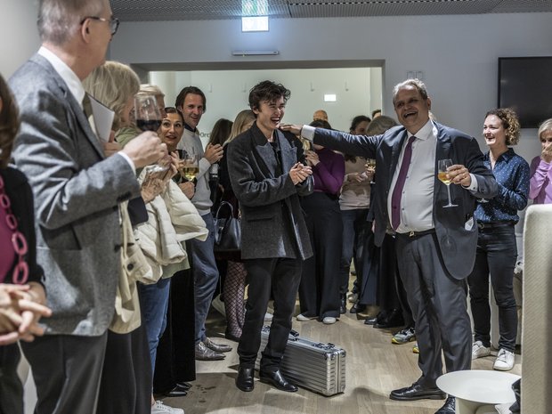 A very happy Michael Haefliger congratulates the orchestra and soloist Daniel Lozakovich on their performance